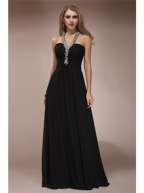Vestidos largos de gasa con cuello halter, sin mangas y con abalorios